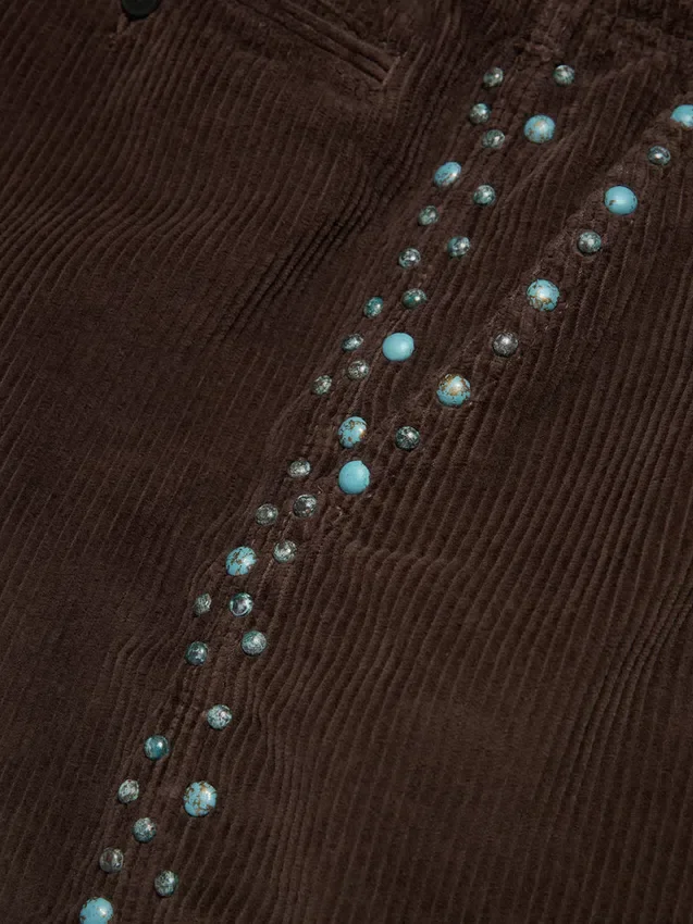 Pantaloncini in velluto a coste con borchie ossidate
