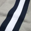 Pantaloni della tuta DT a righe con orlo aperto, grigi