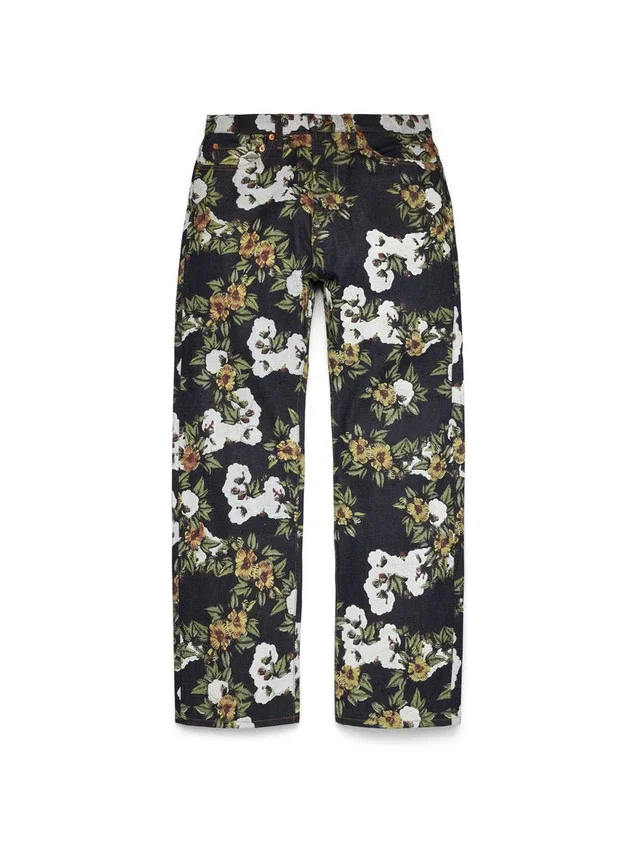 Pantaloni in Denim a zampa larga con motivo floreale e cimosa