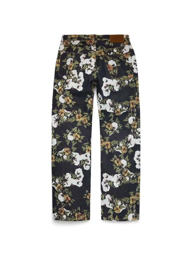 Pantaloni in Denim a zampa larga con motivo floreale e cimosa