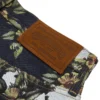 Pantaloni in Denim a zampa larga con motivo floreale e cimosa